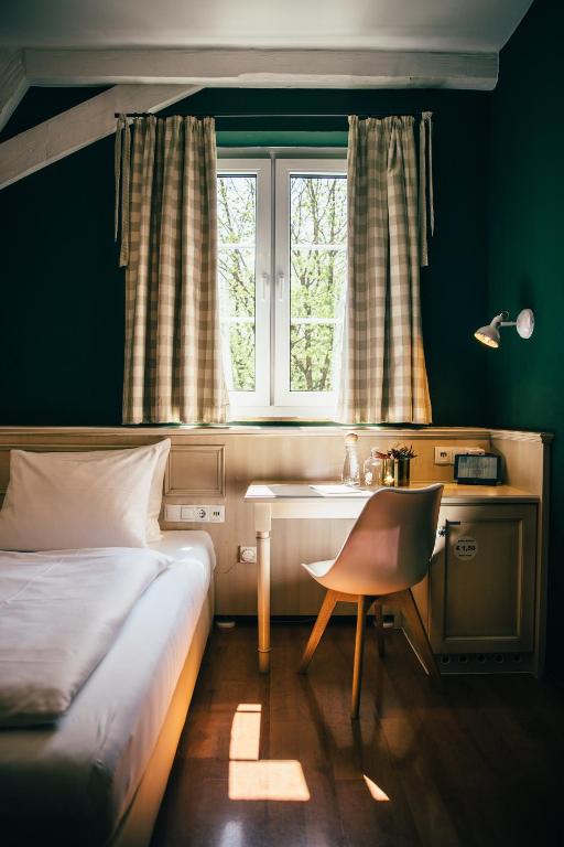 Postel nebo postele na pokoji v ubytování Boutique-Hotel Bayerischer Hof