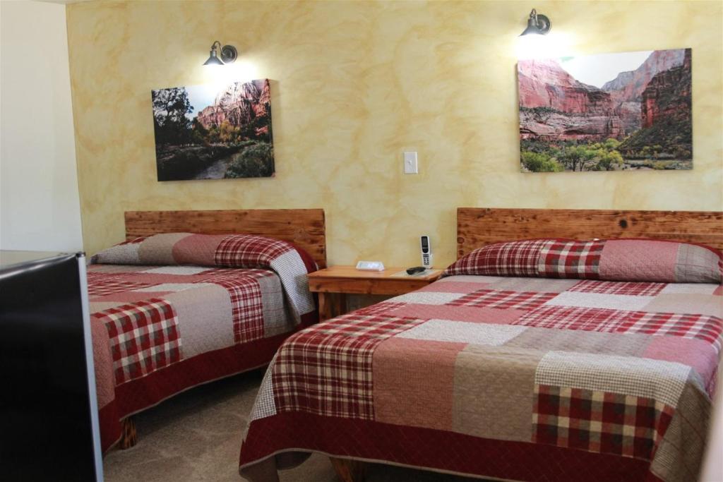 Postel nebo postele na pokoji v ubytování Hurricane Hideaway Lodging
