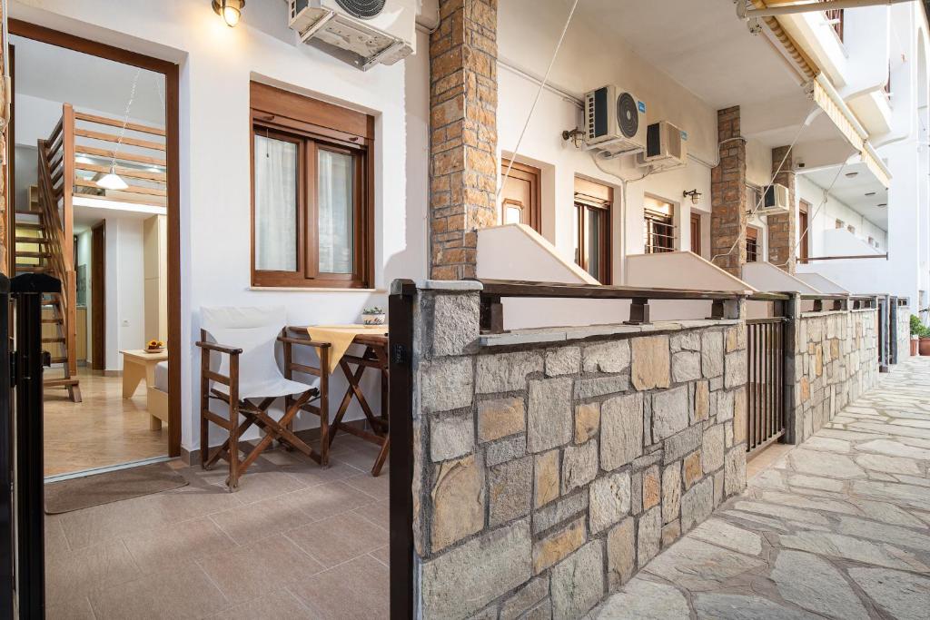 Fotografie z fotogalerie ubytování Akti House Psarogiannis Apartments & Studios v destinaci Vourvourou