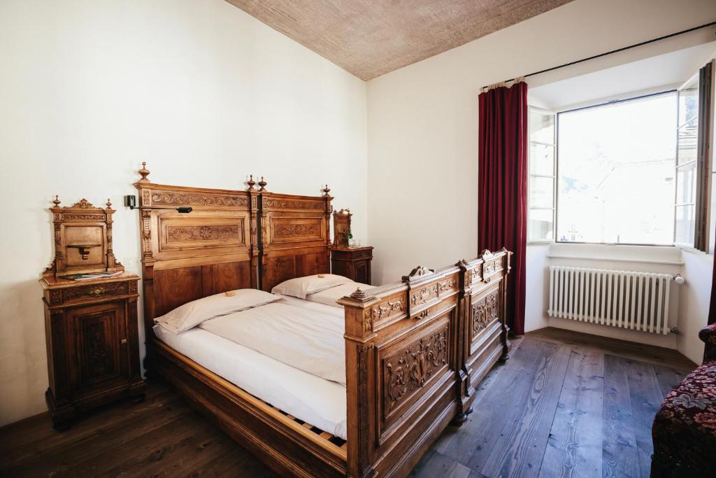 Uma cama ou camas num quarto em Historic Hotel Albrici