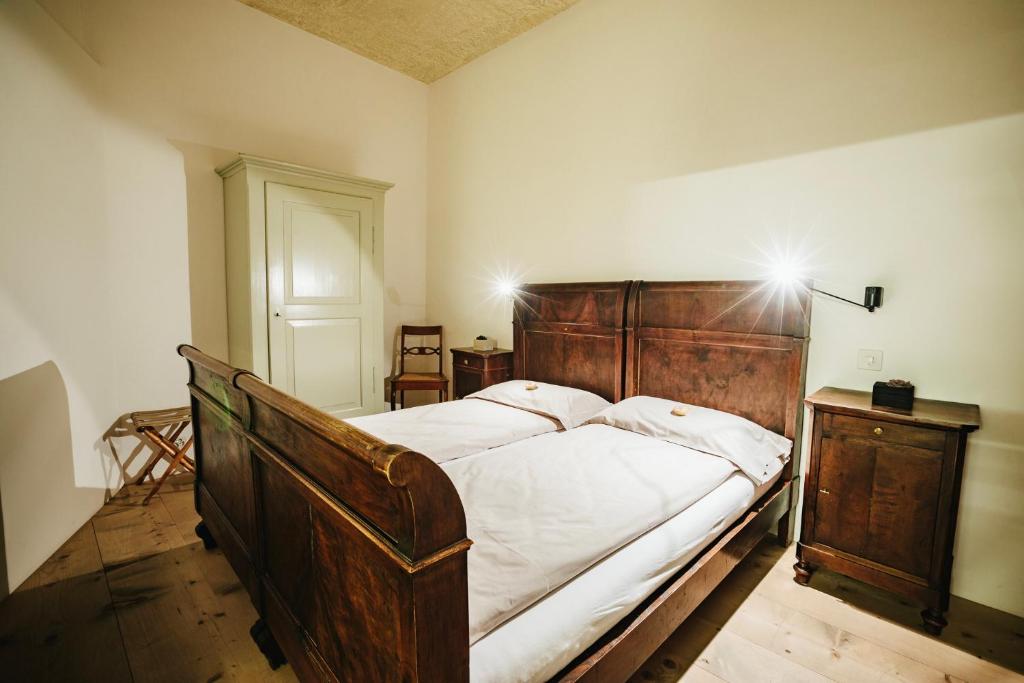 Uma cama ou camas num quarto em Historic Hotel Albrici