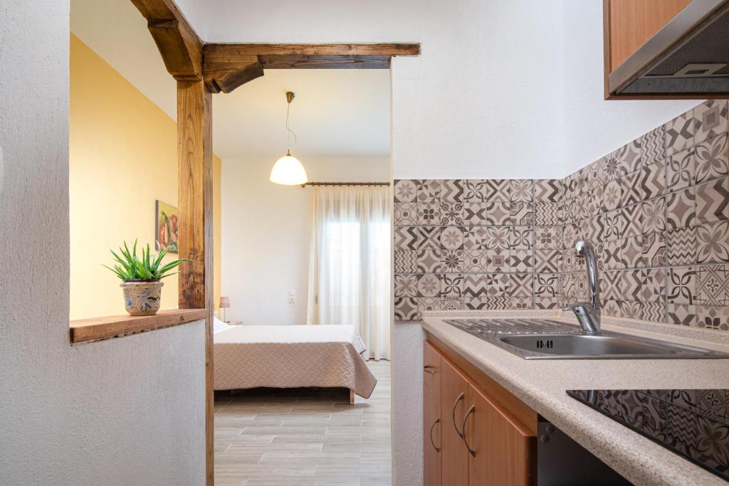 Kuchyň nebo kuchyňský kout v ubytování Akti House Psarogiannis Apartments & Studios