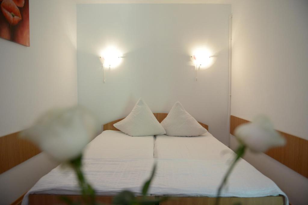 Postel nebo postele na pokoji v ubytování Casa Boby