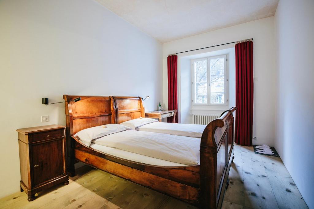 Uma cama ou camas num quarto em Historic Hotel Albrici