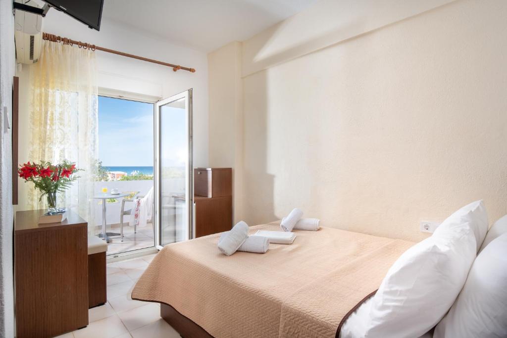 Postel nebo postele na pokoji v ubytování Hotel Stefani