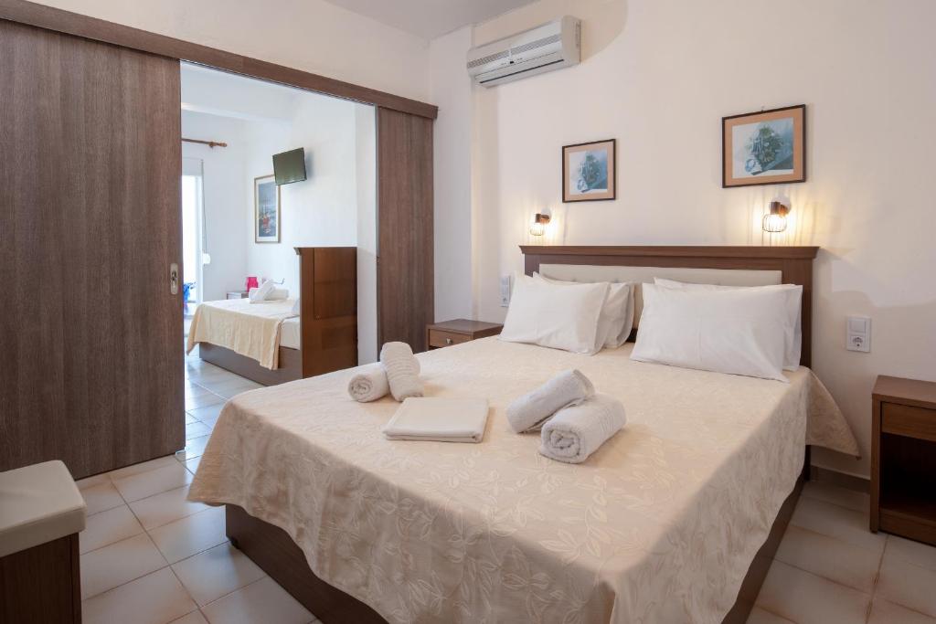 Postel nebo postele na pokoji v ubytování Hotel Stefani
