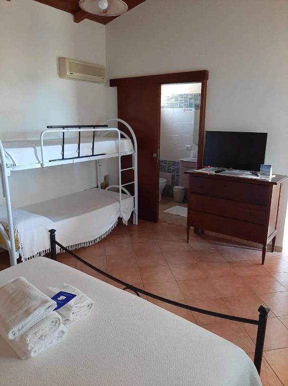 Postel nebo postele na pokoji v ubytování Hotel Belvedere