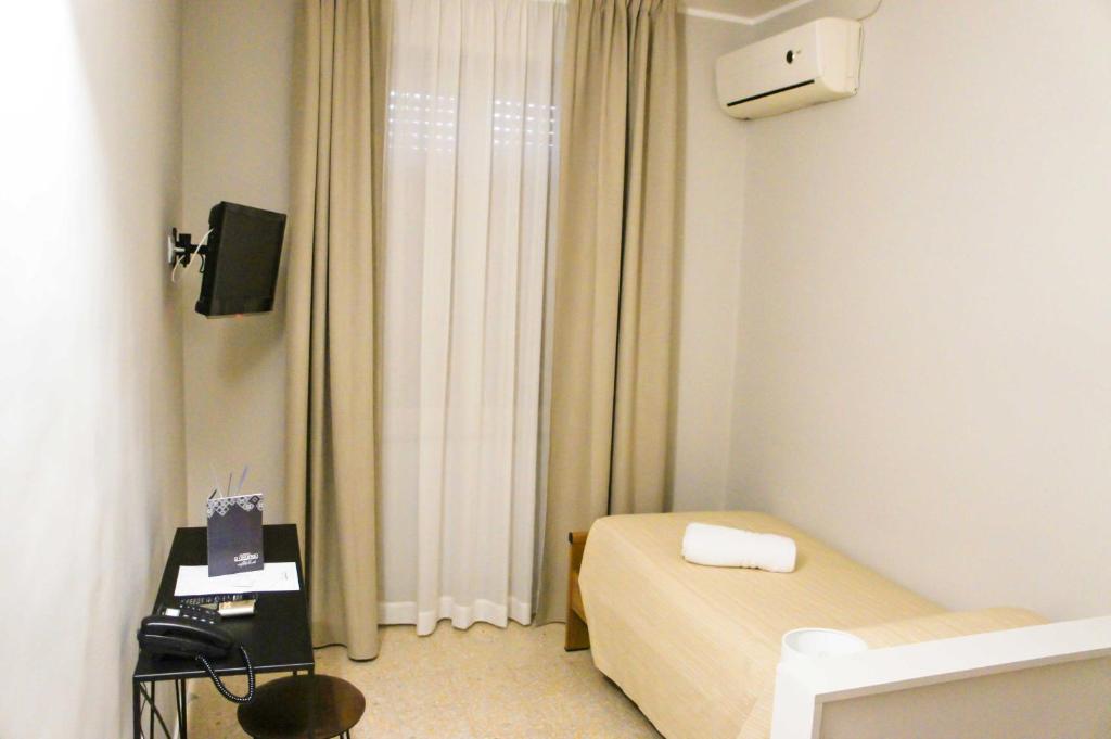TV a/nebo společenská místnost v ubytování Albergo D'Onofrio