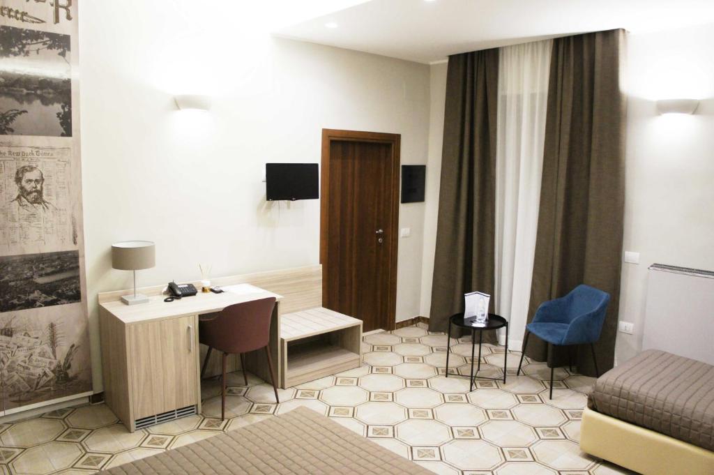 TV a/nebo společenská místnost v ubytování Albergo D'Onofrio