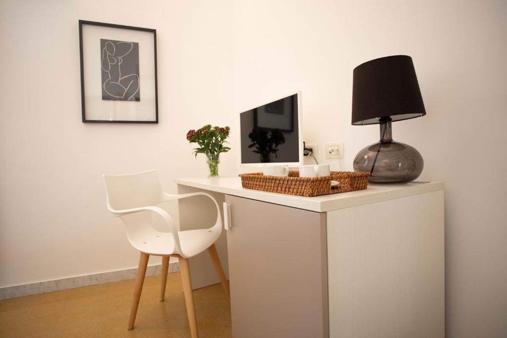 Televízia a/alebo spoločenská miestnosť v ubytovaní Rooms 19 B&B