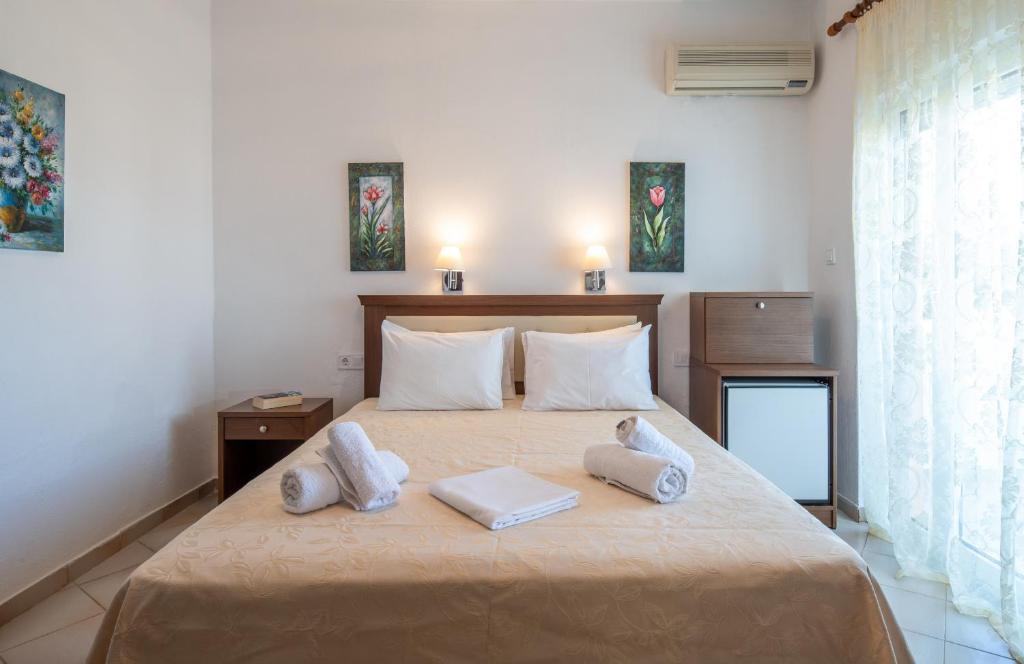 Postel nebo postele na pokoji v ubytování Hotel Stefani