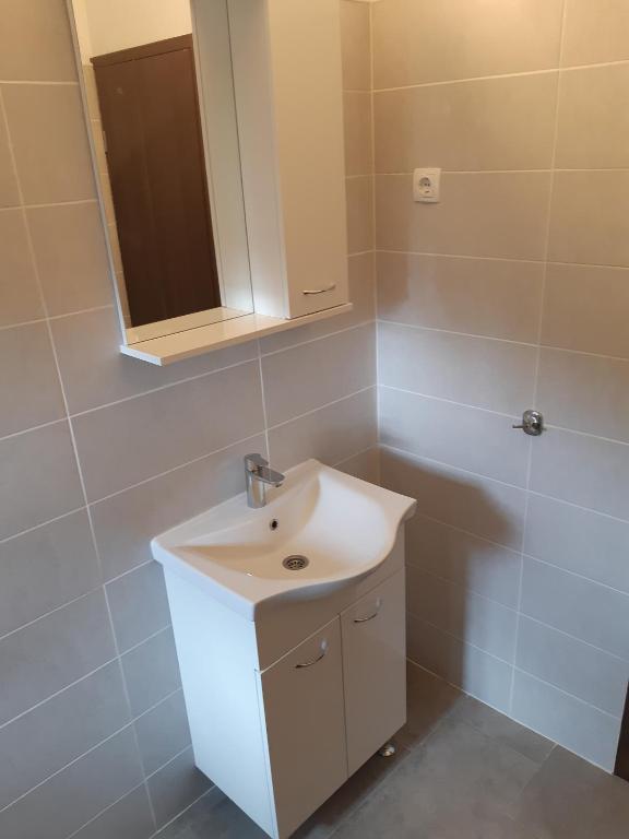 Łazienka w obiekcie Apartments Vukelić