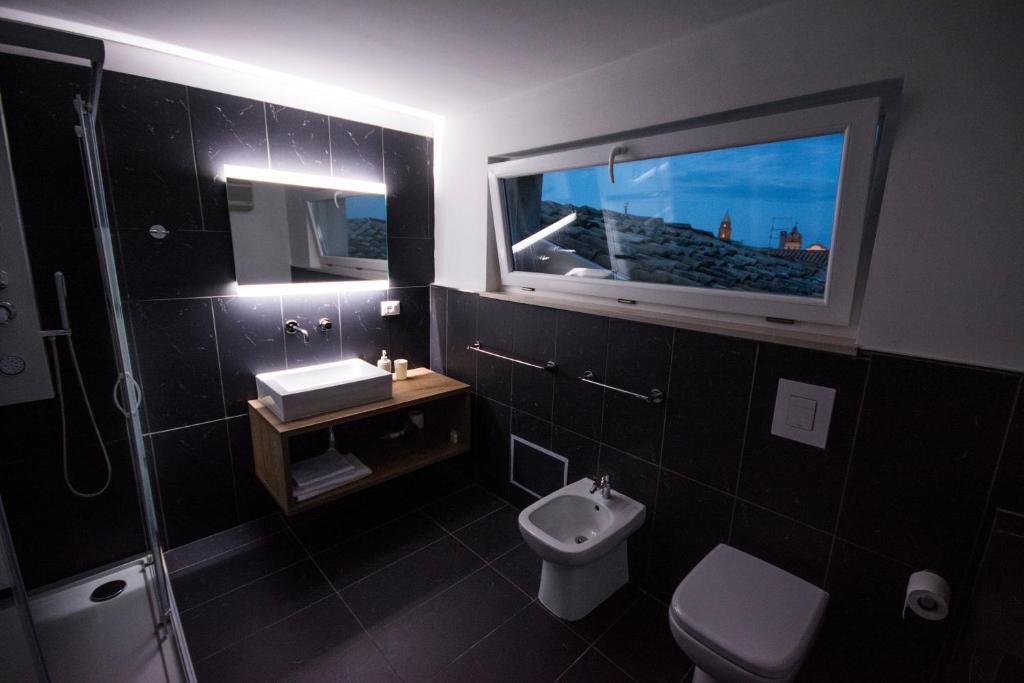 Łazienka w obiekcie Palazzo di Fazio Suites