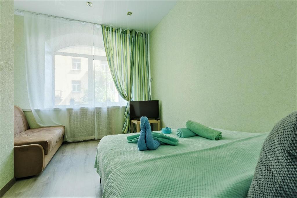 Giường trong phòng chung tại Apartment on Dvoryanskaya 15