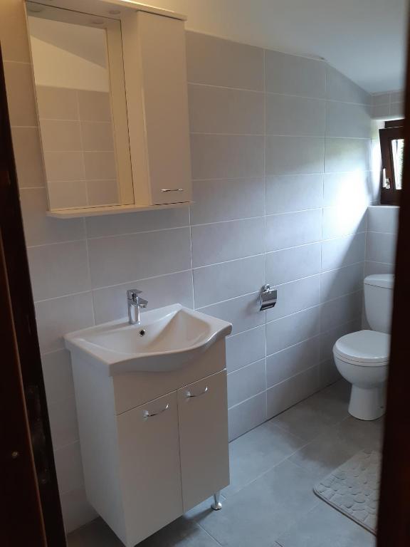 Łazienka w obiekcie Apartments Vukelić