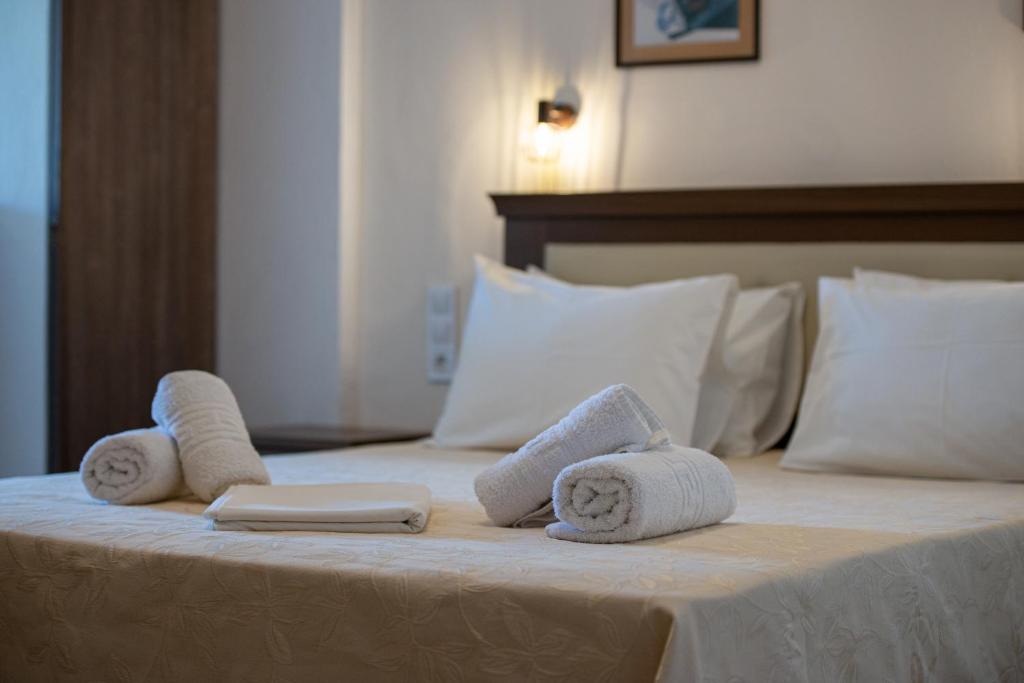 Postel nebo postele na pokoji v ubytování Hotel Stefani