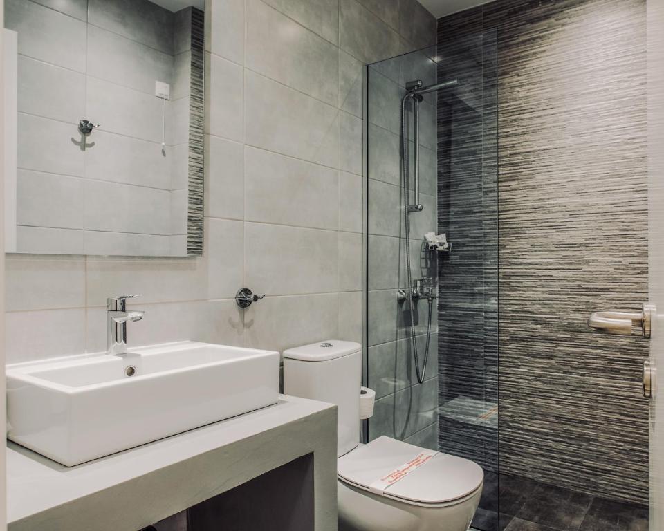 Koupelna v ubytování Poseidonio Hotel