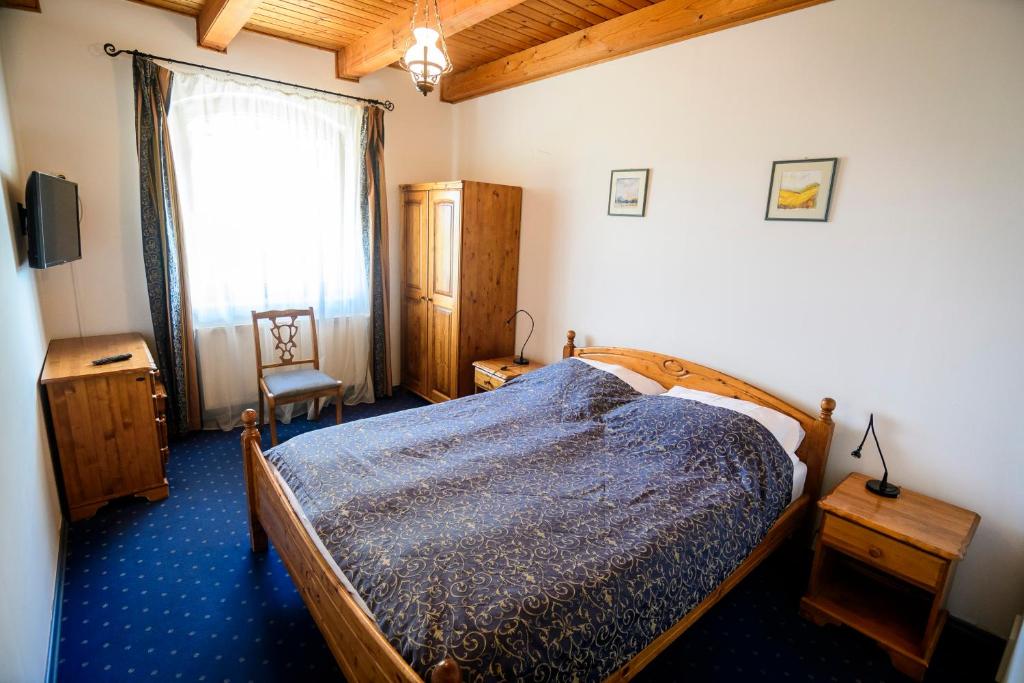 Postel nebo postele na pokoji v ubytování Tekergő Motel és Étterem