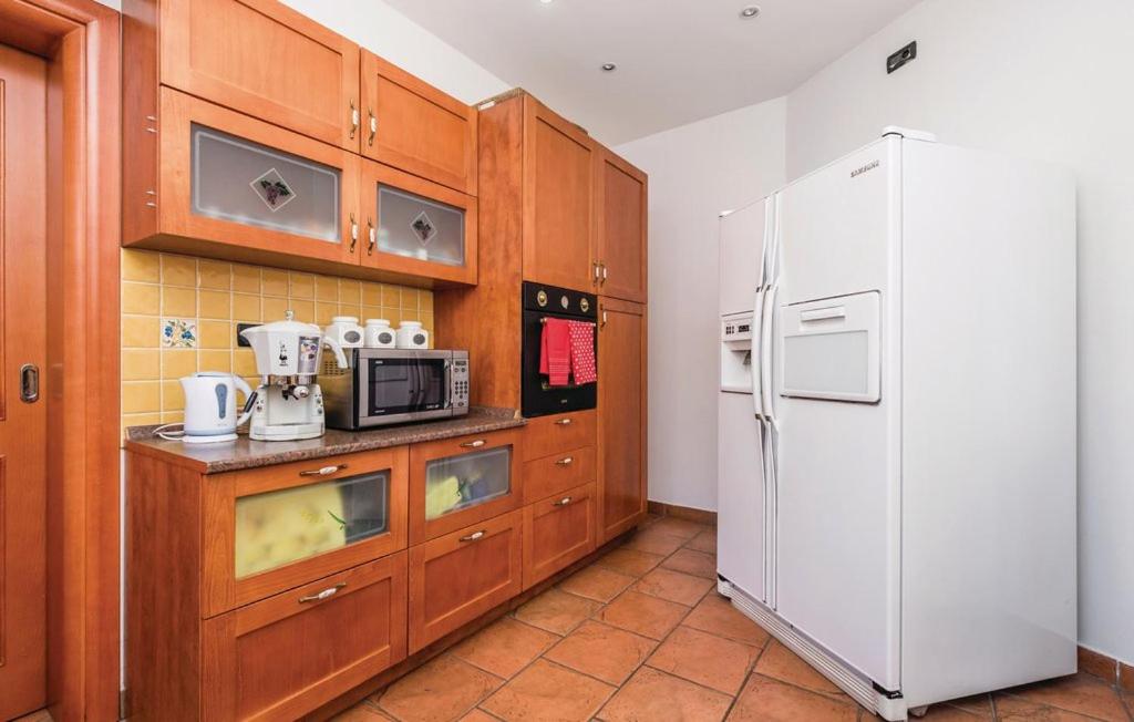 Kuchyňa alebo kuchynka v ubytovaní Sea View - Casa di Arijana