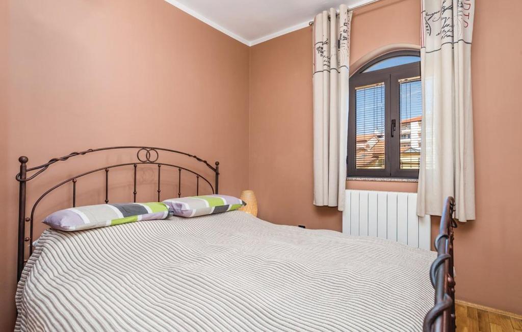 Posteľ alebo postele v izbe v ubytovaní Sea View - Casa di Arijana