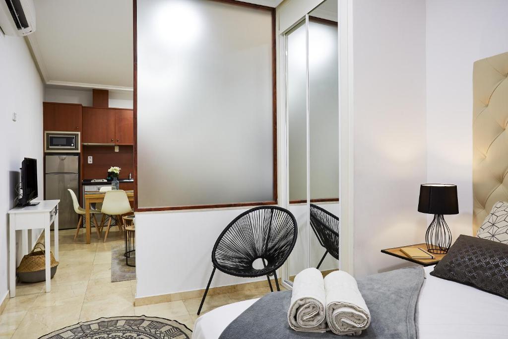 Postel nebo postele na pokoji v ubytování LEEWAYS LOFT V in GRAN VÍA