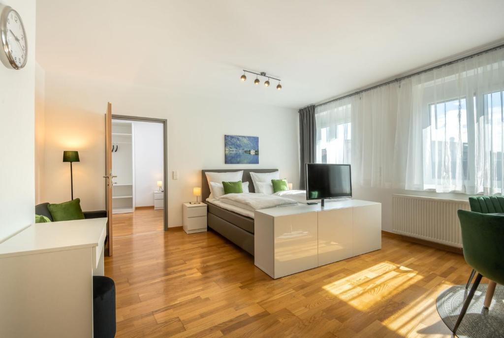 Postel nebo postele na pokoji v ubytování City Appartements Villach