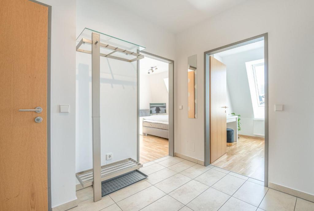 Postel nebo postele na pokoji v ubytování City Appartements Villach
