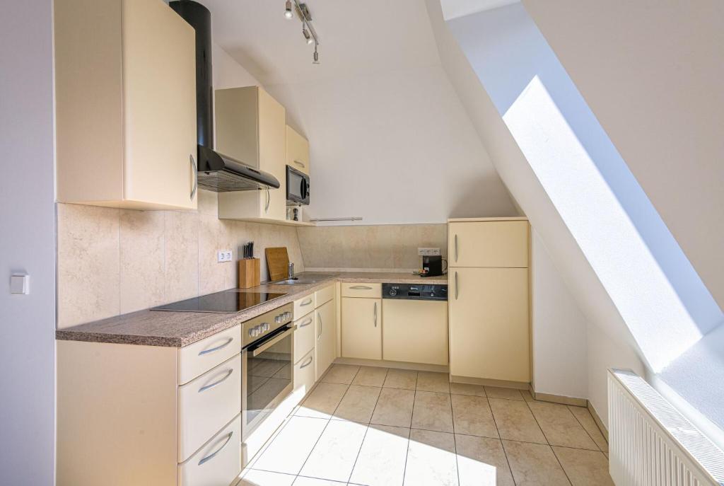Kuchyň nebo kuchyňský kout v ubytování City Appartements Villach