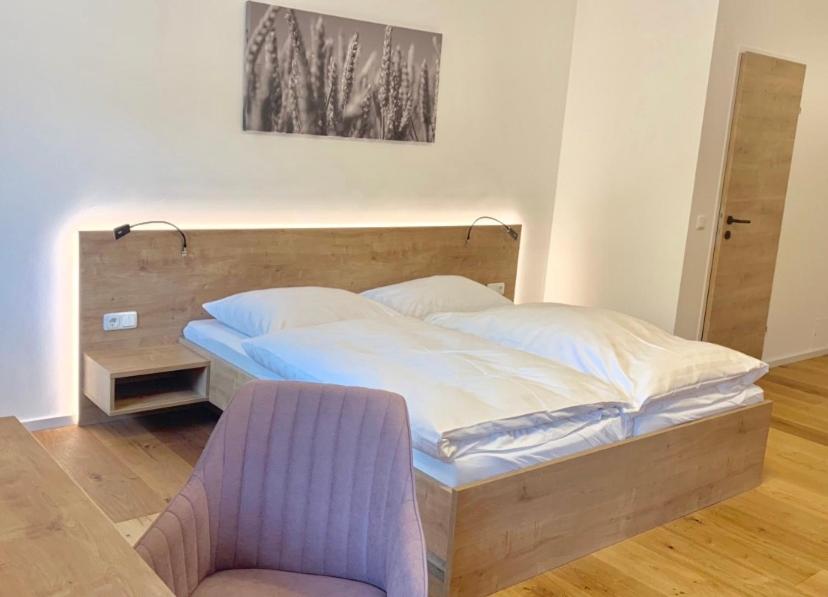 Letto o letti in una camera di Gasthof Fischer Dörnbach