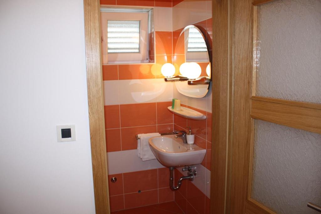 Koupelna v ubytování Apartments Lidija