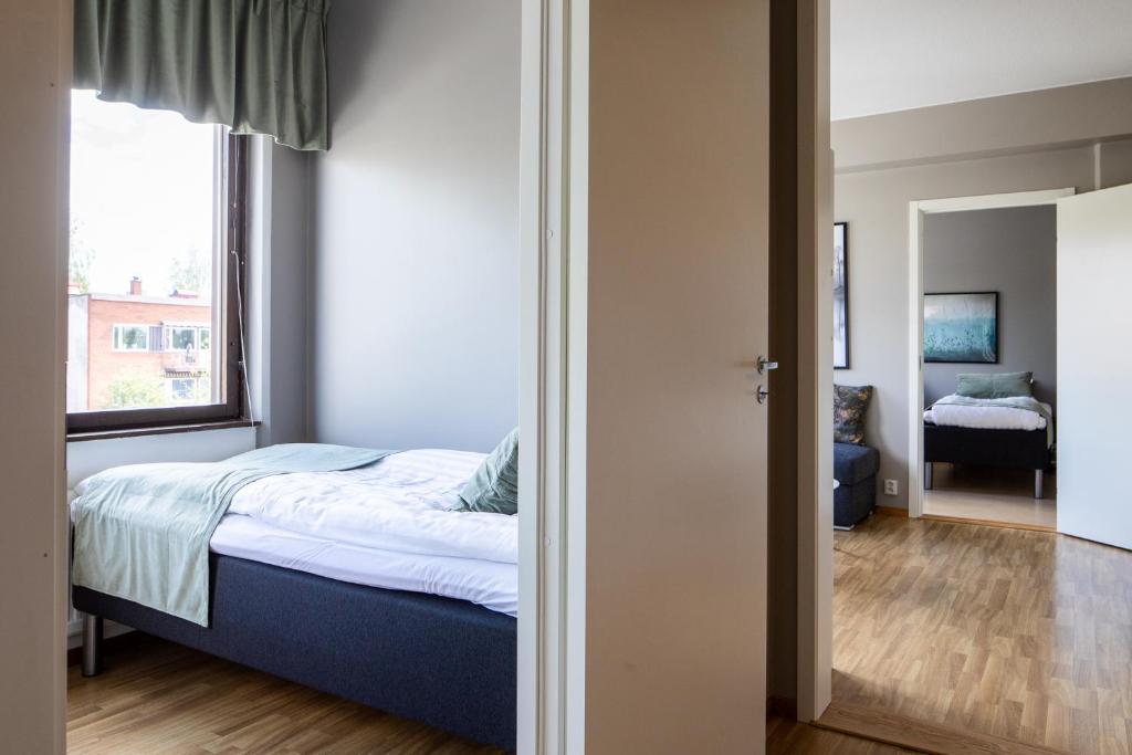 Postel nebo postele na pokoji v ubytování Hotel B&B Gränden