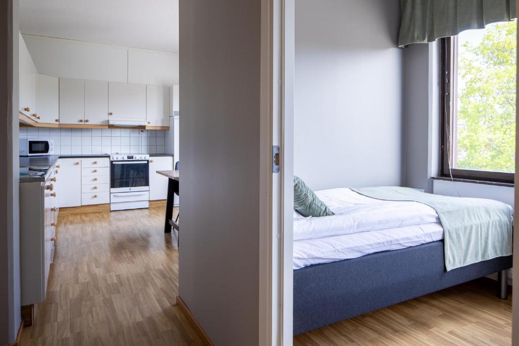 Kuchyň nebo kuchyňský kout v ubytování Hotel B&B Gränden