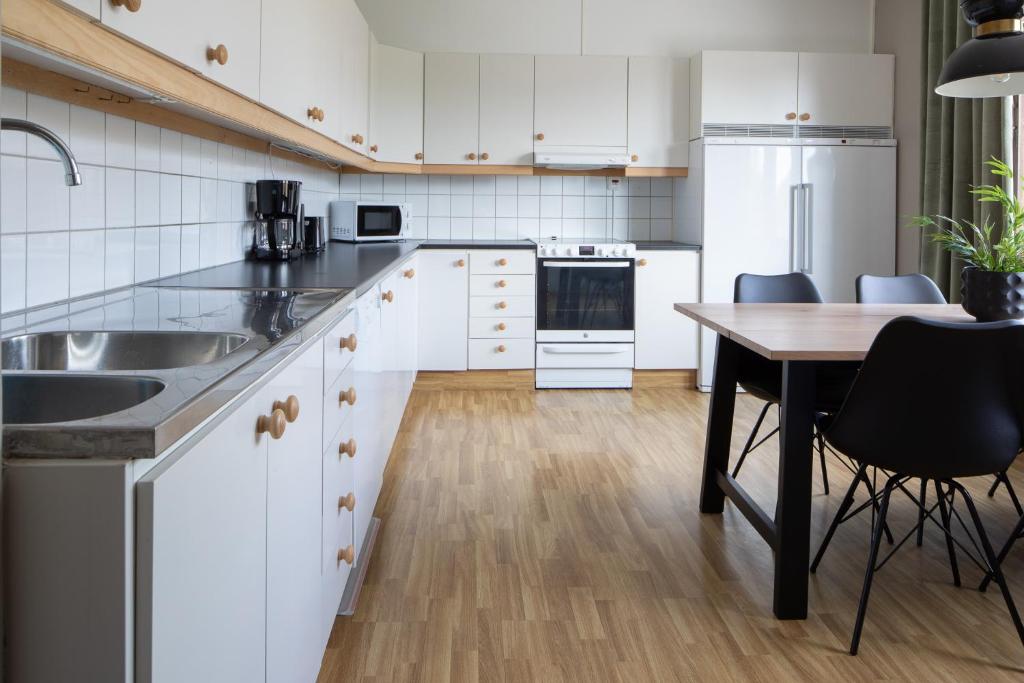 Kuchyň nebo kuchyňský kout v ubytování Hotel B&B Gränden