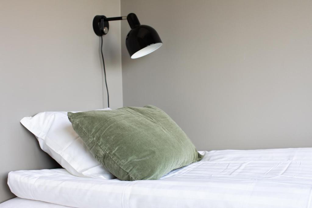 Postel nebo postele na pokoji v ubytování Hotel B&B Gränden