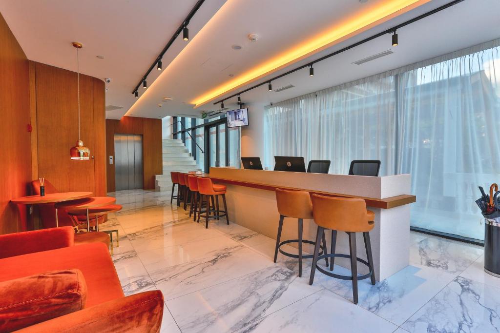 Uma área de estar em Hotel Fagus by Aycon