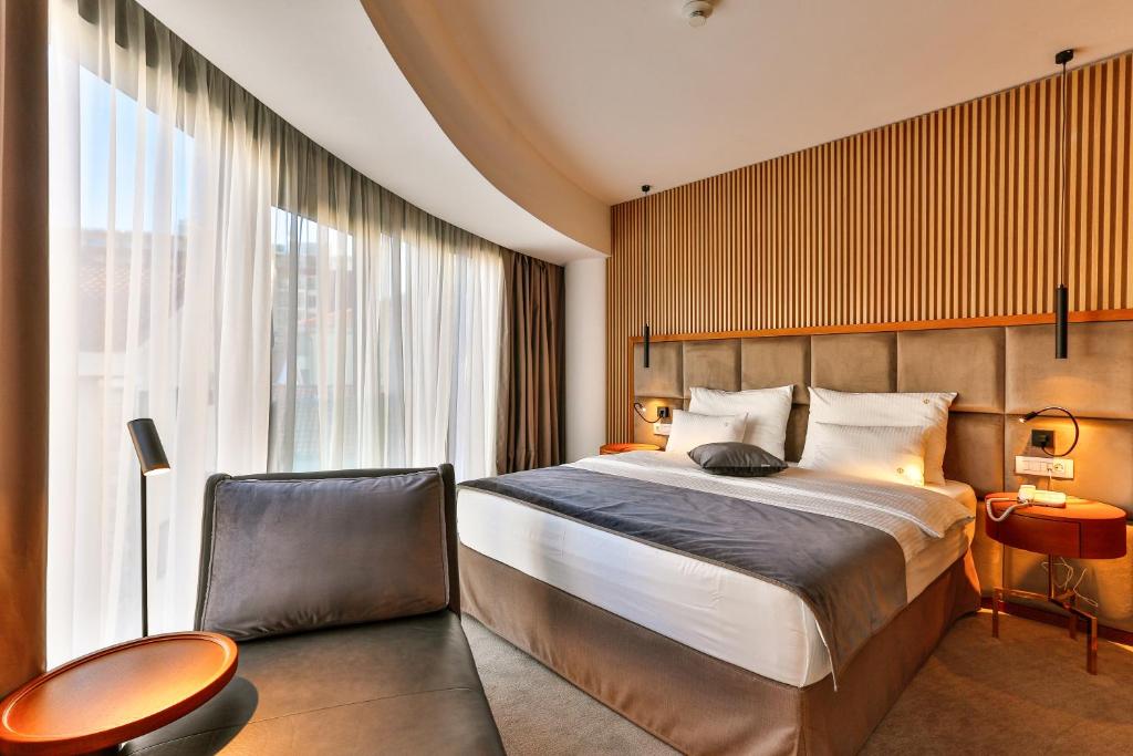 Uma cama ou camas num quarto em Hotel Fagus by Aycon