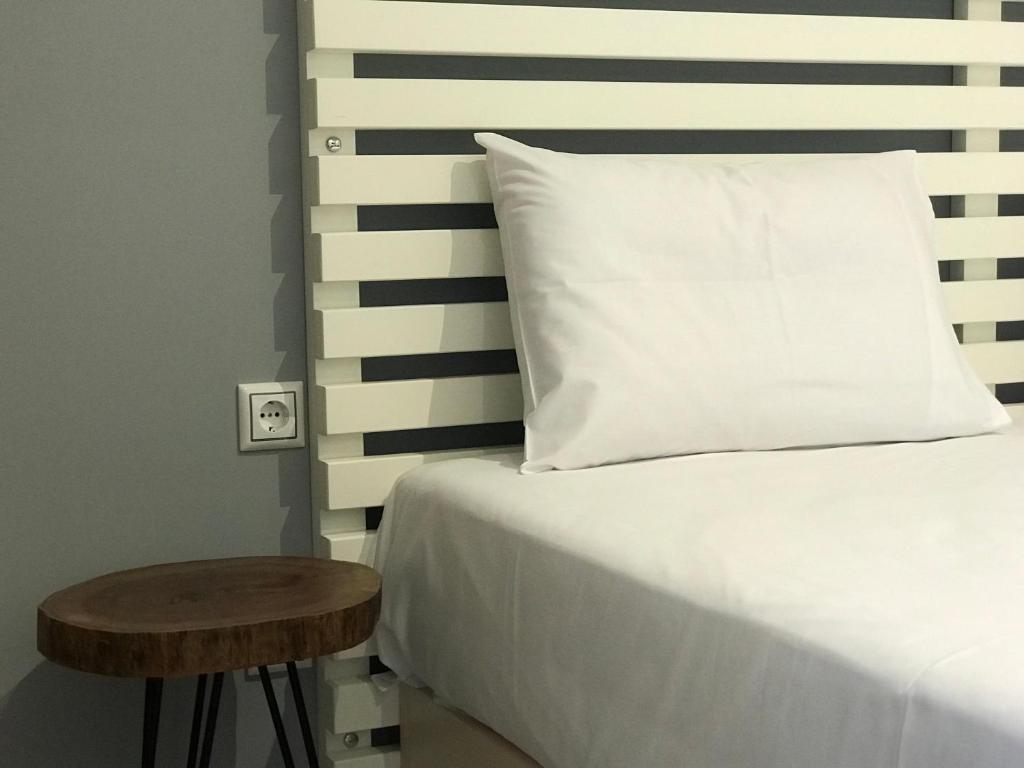 Postel nebo postele na pokoji v ubytování VIAL Rooms