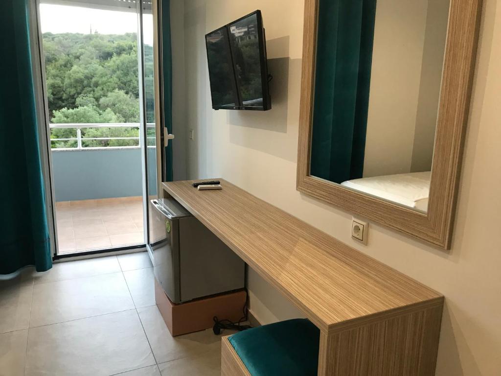 TV a/nebo společenská místnost v ubytování VIAL Rooms
