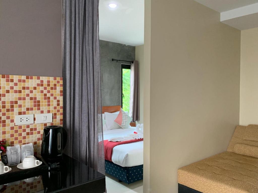 Isayarada Apartment - Standard Triple Room