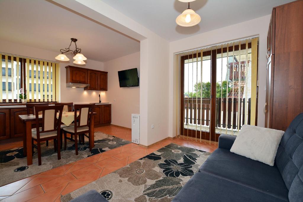 Posedenie v ubytovaní Apartament Kosista