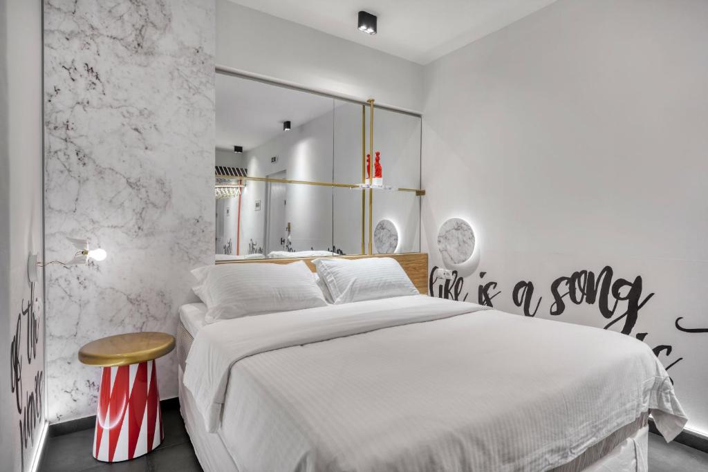 Thomais Boutique Hotelにあるベッド