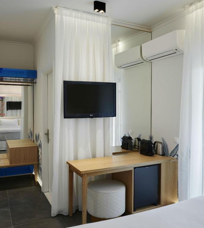 Thomais Boutique Hotelにあるテレビまたはエンターテインメントセンター