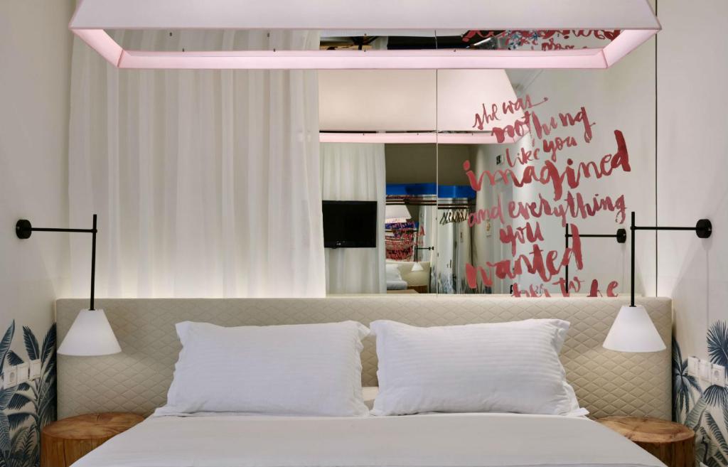 Thomais Boutique Hotelにあるベッド