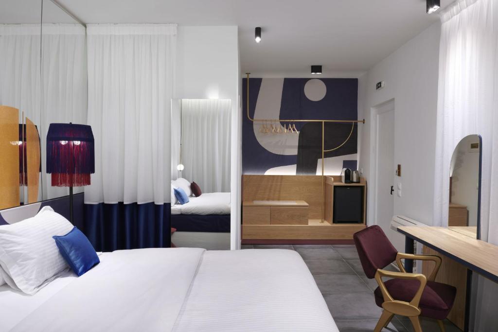 Thomais Boutique Hotelにあるベッド