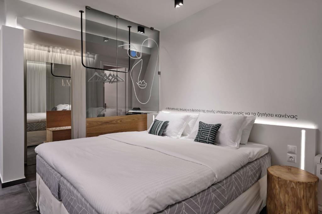 Thomais Boutique Hotelにあるベッド