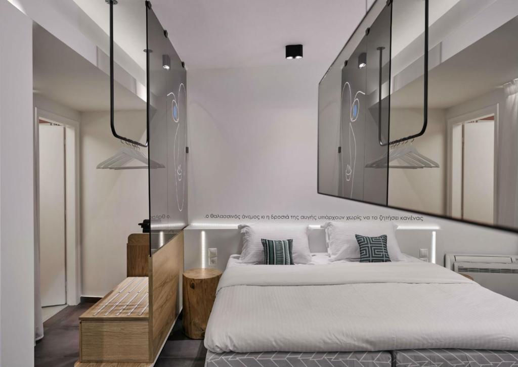 Thomais Boutique Hotelにあるベッド