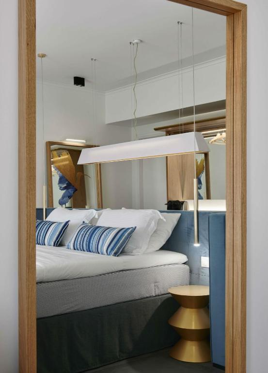 Thomais Boutique Hotelにあるベッド