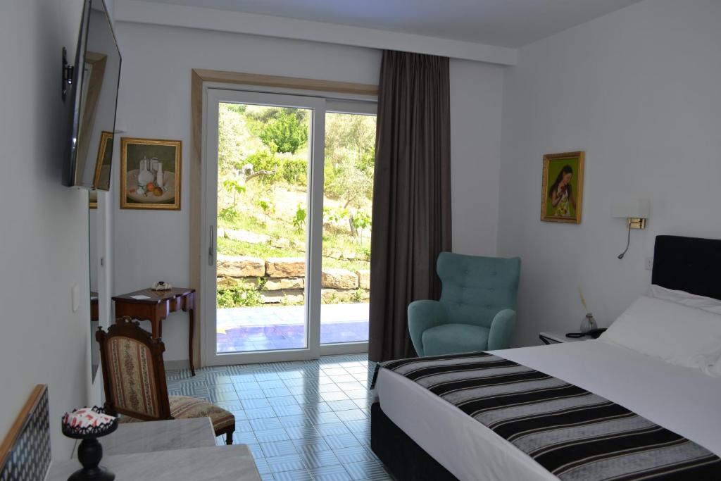 Posteľ alebo postele v izbe v ubytovaní HOTEL MYRTUS