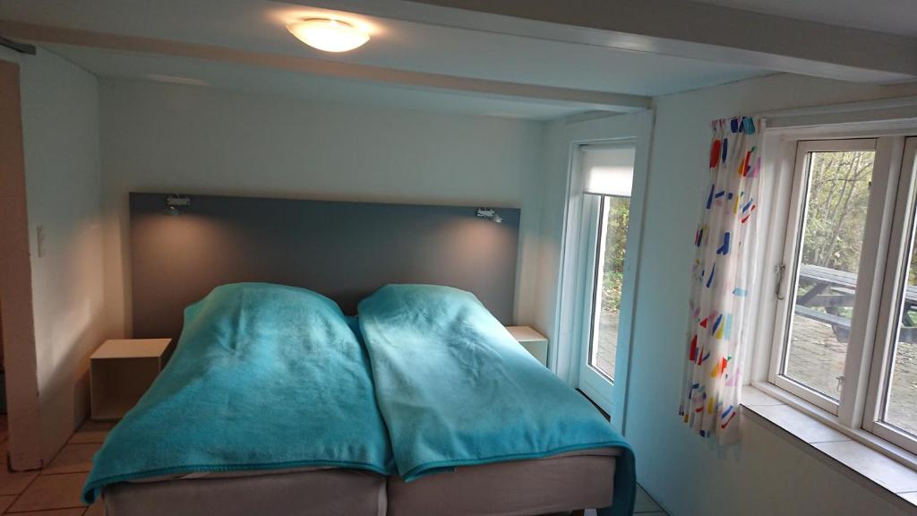Postel nebo postele na pokoji v ubytování B&B Hesselbjerg