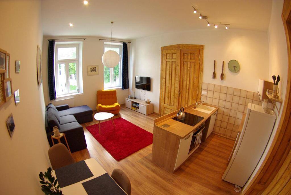 TV a/nebo společenská místnost v ubytování Apartman Egidius